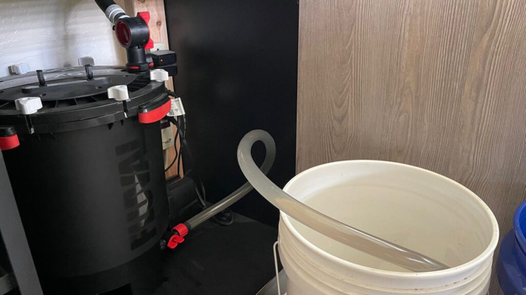 Canister filter in fish tank.