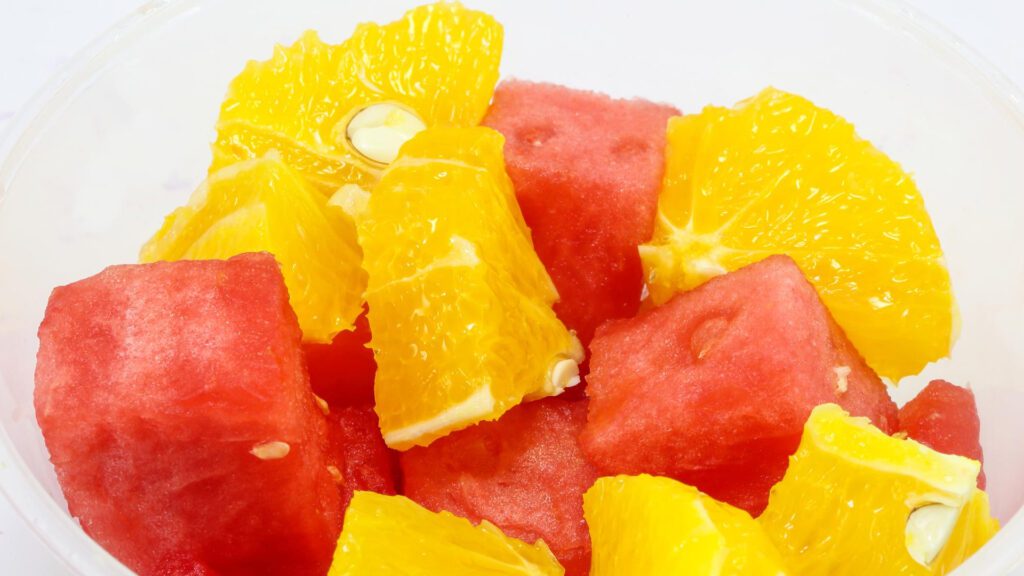 Give your koi fish fresh fruits like oranges and watermelons.